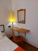 Postel nebo postele na pokoji v ubytování Hotel La Bodega