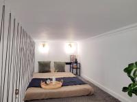 Posteľ alebo postele v izbe v ubytovaní Narutowicza 41 Apartments