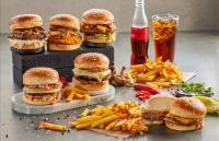 a group of sandwiches and french fries and a drink at Yeşilyurt Park Otel in Corlu