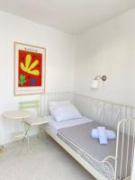 Posteľ alebo postele v izbe v ubytovaní Villa Viento of Mykonos