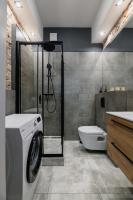 Kúpeľňa v ubytovaní oompH Warsaw Nowy Swiat Apartment
