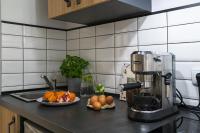Kuchyňa alebo kuchynka v ubytovaní oompH Warsaw Nowy Swiat Apartment