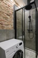 Kúpeľňa v ubytovaní oompH Warsaw Nowy Swiat Apartment