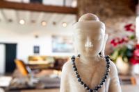 a statue of a woman wearing a necklace at Het Lichthuis in Zandvoort