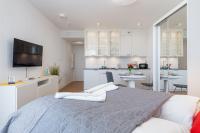 Posteľ alebo postele v izbe v ubytovaní Apartments Mazowiecka by the Sea Pobierowo by Noclegi Renters