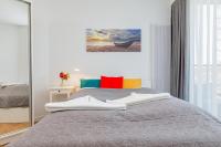 Posteľ alebo postele v izbe v ubytovaní Apartments Mazowiecka by the Sea Pobierowo by Noclegi Renters