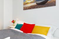 Posteľ alebo postele v izbe v ubytovaní Apartments Mazowiecka by the Sea Pobierowo by Noclegi Renters
