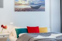 Posteľ alebo postele v izbe v ubytovaní Apartments Mazowiecka by the Sea Pobierowo by Noclegi Renters