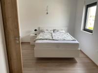 Postel nebo postele na pokoji v ubytování Penthouse Sunset