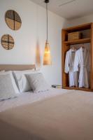 Postel nebo postele na pokoji v ubytování Thea Beachfront Suites in Lourdas beach