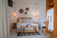 Postel nebo postele na pokoji v ubytování Thea Beachfront Suites in Lourdas beach