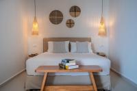 Postel nebo postele na pokoji v ubytování Thea Beachfront Suites in Lourdas beach