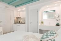 Posteľ alebo postele v izbe v ubytovaní Naxos Evilion Luxury Apartments & Suites