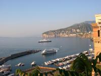 a group of boats docked in a harbor on the water at Terra e Mare in Sorrento