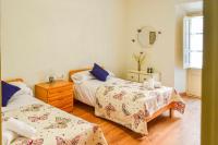 Posteľ alebo postele v izbe v ubytovaní Can Janot Casa con jardín cerca del lago