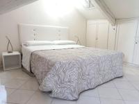 Posteľ alebo postele v izbe v ubytovaní Casanova Apartment San Marco