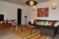 Appartement Villa Taina piscineにあるシーティングエリア