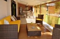 Appartement Villa Taina piscineにあるシーティングエリア