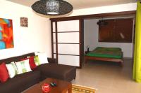 Appartement Villa Taina piscineにあるベッド