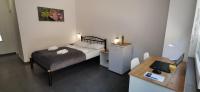 Postel nebo postele na pokoji v ubytování Apartments Cindra