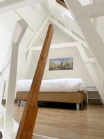 Een bed of bedden in een kamer bij Hotel Residence Le Coin