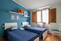 Posteľ alebo postele v izbe v ubytovaní Casa del Sole