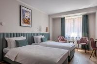 Posteľ alebo postele v izbe v ubytovaní Hotel H12****