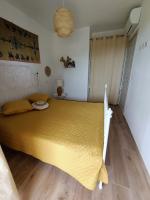 A bed or beds in a room at Alghero - House with Panoramic View immersed in full nature