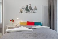 Posteľ alebo postele v izbe v ubytovaní Apartments Mazowiecka by the Sea Pobierowo by Noclegi Renters