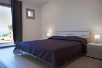 Posteľ alebo postele v izbe v ubytovaní Villa Liam con Piscina - Goelba