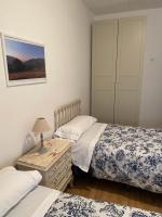 Postel nebo postele na pokoji v ubytování Hostal Casiano Camarasa