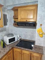 Kuchyň nebo kuchyňský kout v ubytování Edificio Gavota