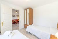 Postel nebo postele na pokoji v ubytování Villa Rosa