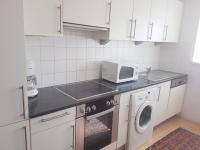 A kitchen or kitchenette at Hotel Haydn