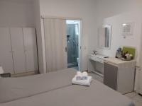 Postel nebo postele na pokoji v ubytování Morpheas Pension Rooms & Apartments