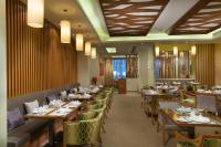 Centara Muscat Hotel Omanにあるレストランまたは飲食店