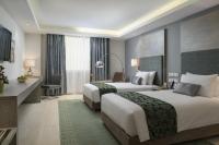 Centara Muscat Hotel Omanにあるベッド