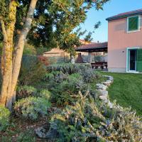 a garden in front of a house at Villa Malini in Grožnjan