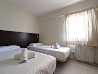 Posteľ alebo postele v izbe v ubytovaní ClassBedroom Gothic Ramblas Apartments
