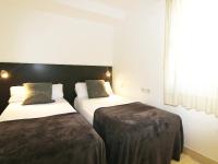 Posteľ alebo postele v izbe v ubytovaní ClassBedroom Gothic Ramblas Apartments