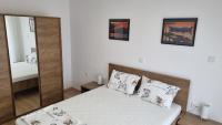 Posteľ alebo postele v izbe v ubytovaní Apartmani Mali