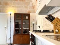 A kitchen or kitchenette at Chez Isabelle - Puglia Mia Apartments
