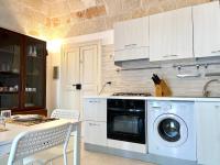 A kitchen or kitchenette at Chez Isabelle - Puglia Mia Apartments