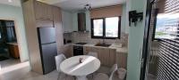 Kuchyň nebo kuchyňský kout v ubytování Sandy Cozy Apartments