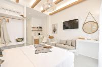 Televízia a/alebo spoločenská miestnosť v ubytovaní Flèria Seaview Suites
