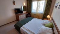 Postel nebo postele na pokoji v ubytování Free SPA в Св. Иван Рилски - Сладък дом сред лукс