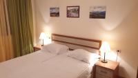 Postel nebo postele na pokoji v ubytování Free SPA в Св. Иван Рилски - Сладък дом сред лукс