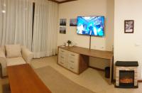TV a/nebo společenská místnost v ubytování Free SPA в Св. Иван Рилски - Сладък дом сред лукс