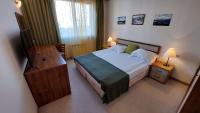 Postel nebo postele na pokoji v ubytování Free SPA в Св. Иван Рилски - Сладък дом сред лукс