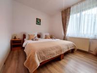 Posteľ alebo postele v izbe v ubytovaní Lazy Bear